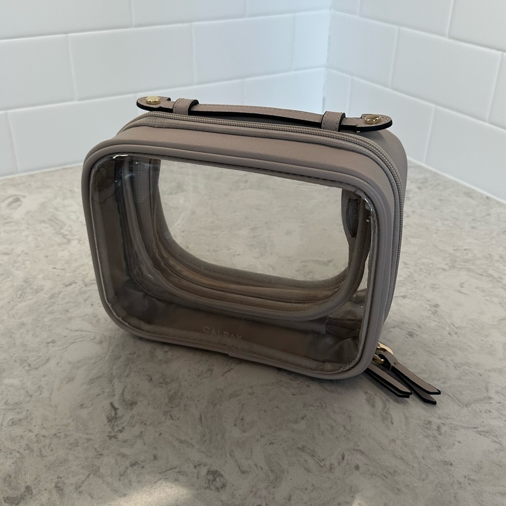 Calpak Small Clear Cosmetic Case in Stone